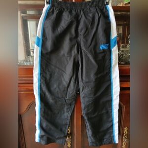 Nike Black Track Pants with Blue and White Stripes. Kids‎ .sz 7